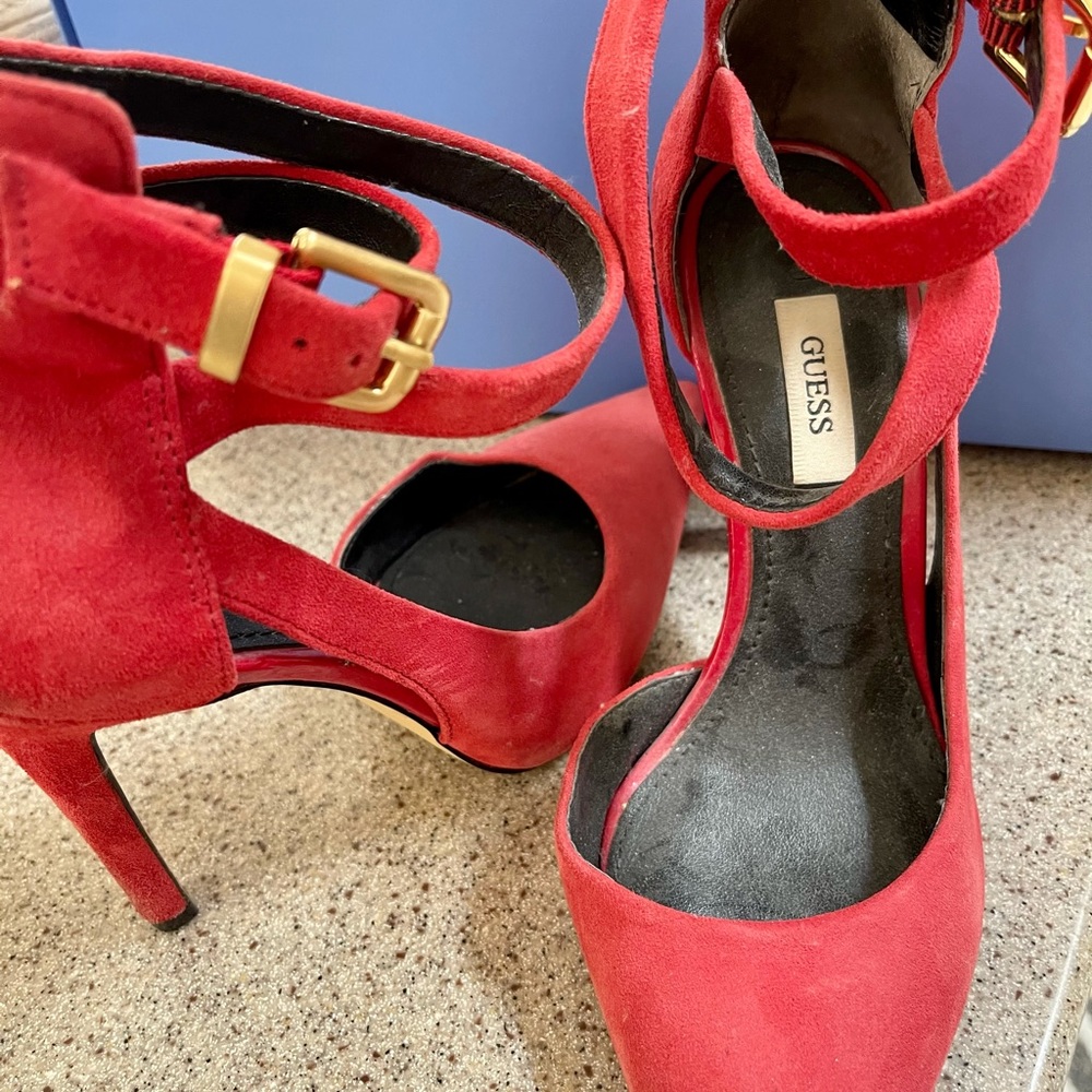 Red suede pumps
